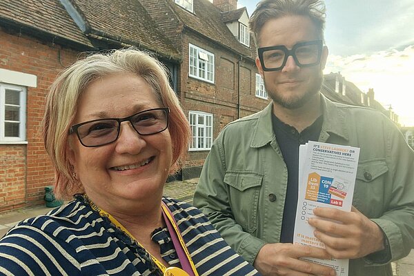 Councillor Sherrilyn Bateman and Councillor Tim Dixon holding a leaflet