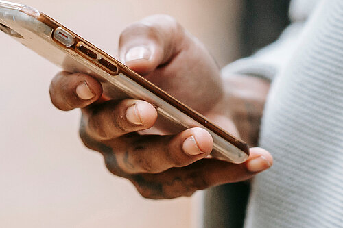 Mobile A hand holding a mobile phone